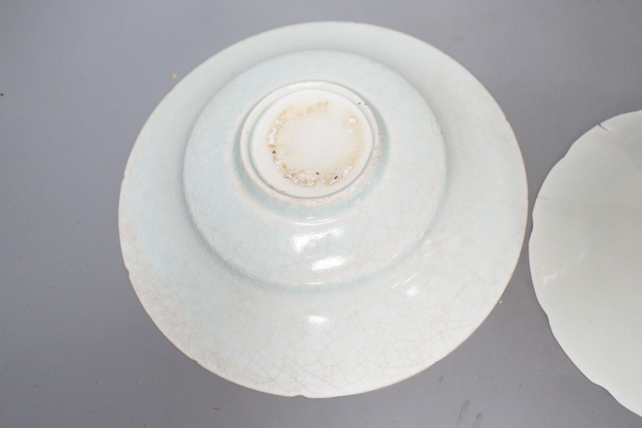 A Chinese soapstone carving, three Qingbai type bowls, 29cm